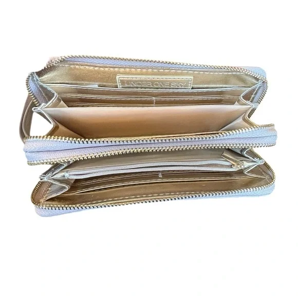 Under One Sky Wristlet Ivory with leather flower cut outs - Picture 6 of 11